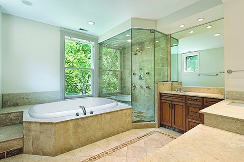 sylvia beauty incased in tan marble in a bathroom